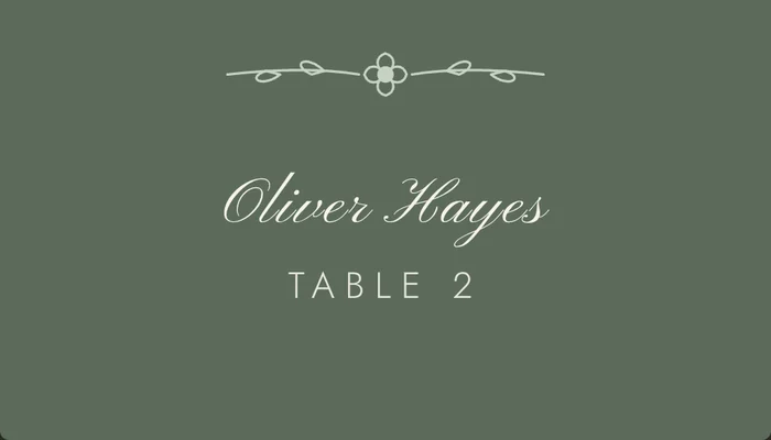 Sage green place card with white script name